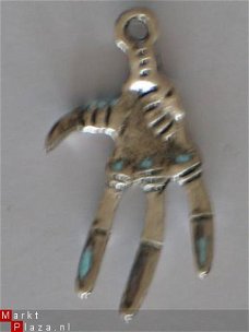 silver skeleton hand