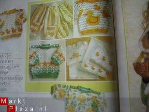 Baby-uitzetboekje met bloemen en eendjes - nr. 1