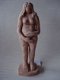 Terracotta beeldje van vrouw met haar handen op haar buik - 1 - Thumbnail