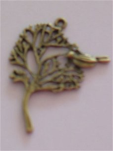 bronze tree with bird