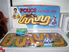 Blikken Seelgoed. rondrijdende: Politieauto. Patrol Car.