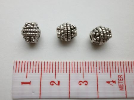 Kralenkapjes kleine blaadjes 5,5 mm oudzilverkleur. - 1