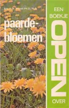 Een boekje open over paardebloemen. Het gouden wonder-kruis