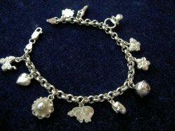 Voorbeeld jasseron armband met bedeltjes