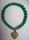 armband met echte parelmoer parel groen met brons bedel hart - 1 - Thumbnail