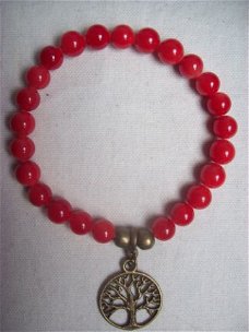 rode parelmoer-parel armband met brons en bedel