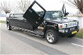 Hummer H2 limousine zwart met Lambo deuren - 1 - Thumbnail