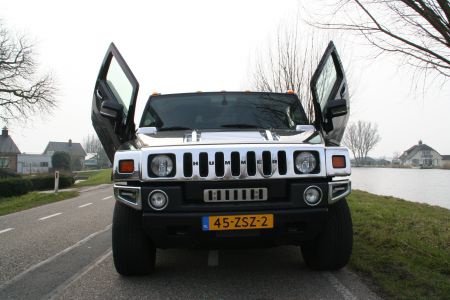 Hummer H2 limousine zwart met Lambo deuren - 1