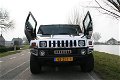 Hummer H2 limousine zwart met Lambo deuren - 1 - Thumbnail