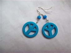 peace oorbellen blauwe oorcandy s vredesteken neon ibiza goa