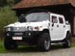 Hummer H2 SUT huren of rijden in het wit en zwart - 1 - Thumbnail