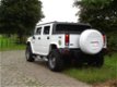 Hummer H2 SUT huren of rijden in het wit en zwart - 1 - Thumbnail