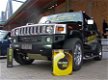 Hummer H2 SUT huren of rijden in het wit en zwart - 1 - Thumbnail