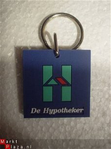 Sleutelhanger "De hypotheker", NIEUW,zacht plastic