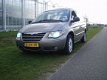 Chrysler Voyager - 2.8crd se luxe aut - 1 - Thumbnail