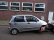 Daewoo Matiz zilver plaatwerk en onderdelen Sloopauto inkoop Den haag - 2 - Thumbnail