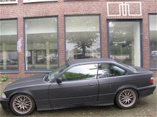 BMW E 36 coupe Zwart Onderdelen en Plaatwerk Sloopauto inkoop Den haag