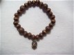 spirituele boeddha armband bruin sandelwood bronzen kralen en buddha bedel - 1 - Thumbnail