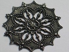 Silver filigree flower