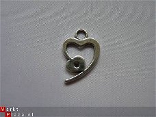 Tibetaans zilveren bedel - dubbel hart