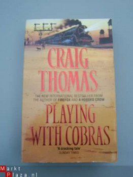 Playing with cobras. GRAIG THOMAS. - 1