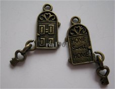 bedeltje/charm sleutel :home sweet home brons - 20x11 mm