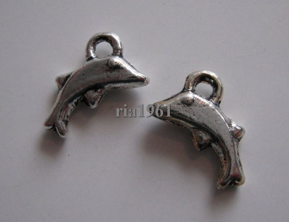 bedeltje/charm vis:mini-dolfijntjes :10 mm - 10 voor 0,75 - nr. 1