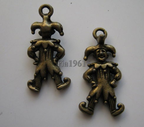 bedeltje/charm op is op:harlekijntje brons - 25 x 12 mm(nog 11 st.) - nr. 1
