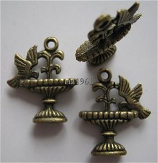 bedeltje/charm vogels:vogelbadje brons - 21x18x5 mm