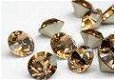 Swarovski 1028 Light Smoked Topaz 2mm pp14 10 Stuk - 1 - Thumbnail