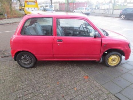 Daihatsu Cuore 1.0 12v 2002 Motorblok Sloopauto inkoop Den haag - 5