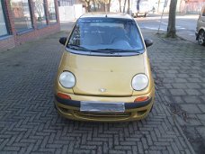 Daewoo Matiz Bj 1999 Geel Plaatwerk en Onderdelen Sloopauto inkoop Den haag