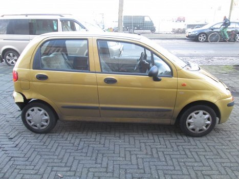 Daewoo Matiz Bj 1999 Geel Plaatwerk en Onderdelen Sloopauto inkoop Den haag - 3