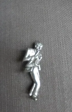 Broche saxofoonspeler