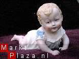 JONGEN - piano doll - porselein - nr. 1