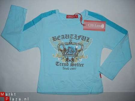 Turquoise shirt met kroonembleem in maat 110/116 AFGEPRIJSD - 1