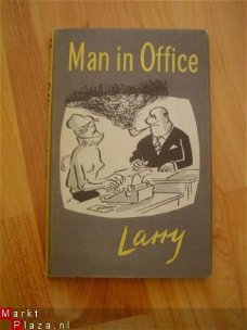 Man in office by Larry