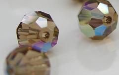 Swarovski 5000 Light Smoked Topaz AB 6mm Per Stuk. - 1