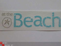 OPRUIMING: rubon title wave at the beach