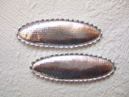 5 cm ~ Ovaal glanzend kniphoesje ~ Zilver - 1