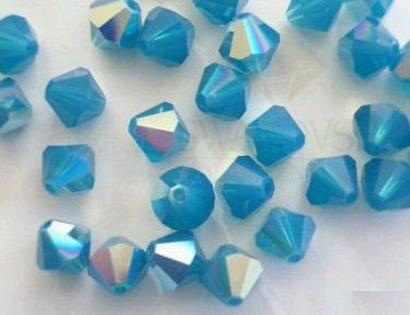 Swarovski 5301 Caribbean Blue Opal AB 4mm Per 10 Stuk - 1