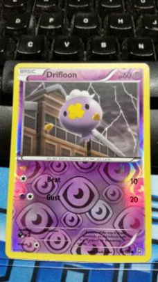 Drifloon 50/124 (reverse foil) BW Dragons Exalted