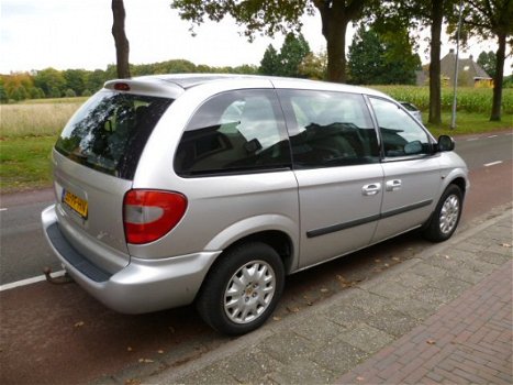 Chrysler Voyager - 2.4I SE LUXE 7-PERS - 1