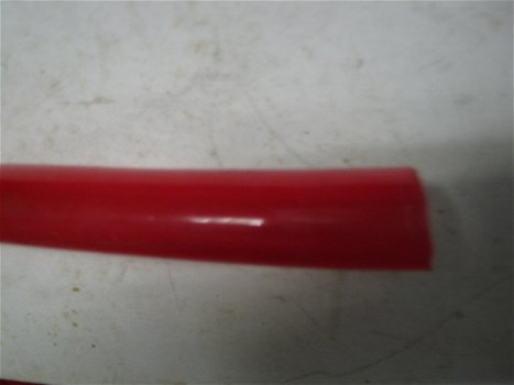 10 mtr. rode doorzichtige pvc waterslang, glad 3.2 x 4.2 cm. - 1