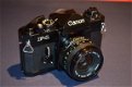 Komplete set Canon fotoapparatuur F-1 en A-1 in nieuwstaat - 1 - Thumbnail