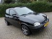 Opel Corsa - 1.2i-16V Sport - 1 - Thumbnail