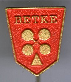 Betke Hollandsche Cacaofabriek - Amsterdam rood op koper speldje ( BOEK 1 NR 103 )