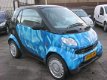 Smart Fortwo - 0.7 PURE, AUTOMAAT VOL/SEMI, STUURBEKRACHTIGING, PANORAMADAK, ELEK-RAMEN, CENT-VERGRE - 1 - Thumbnail