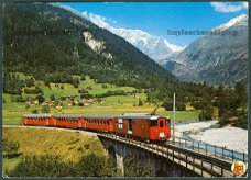ZWITSERLAND Furka-Oberalp Bahn (FO), elec. tandrad-smalspoor-loc Deh 4-4 I-serie (Fiesch 1981)