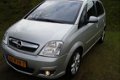 Opel Meriva - 1.8-16V COSMO_AUTOMAAT_HOGE-INSTAP_AIRCO_PDC_INR&GAR.MOG - 1 - Thumbnail